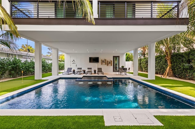 view of pool featuring a patio