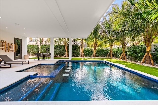 view of pool featuring a patio area