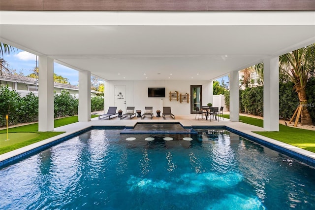 view of pool featuring a patio