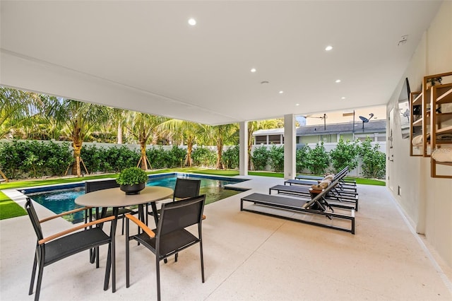 view of patio / terrace featuring a fenced in pool