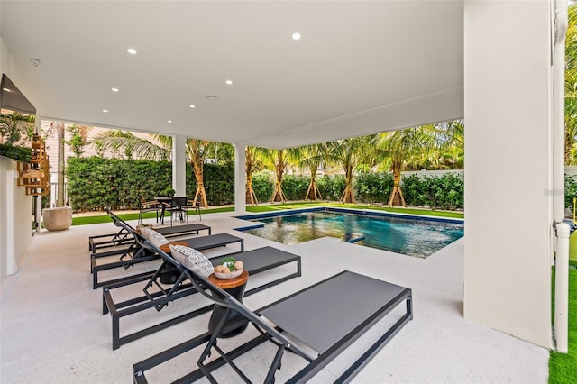 view of swimming pool featuring a patio