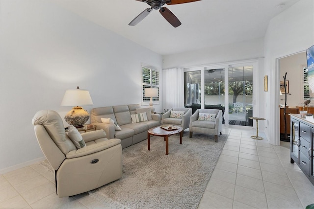 tiled living room featuring ceiling fan