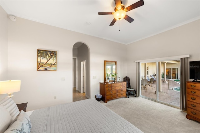 bedroom with ceiling fan, light colored carpet, and access to outside