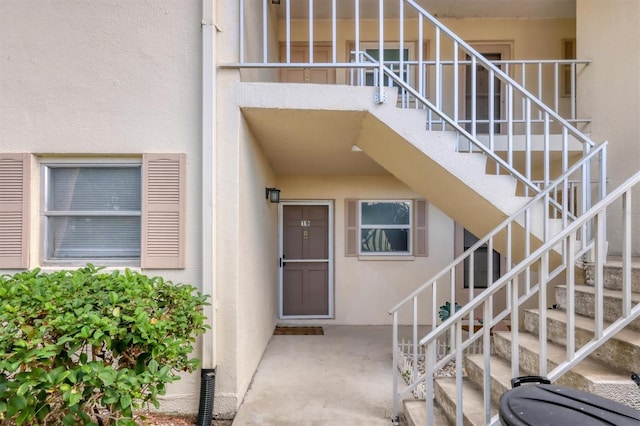 doorway to property featuring a patio area