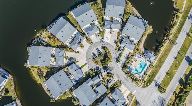 drone / aerial view featuring a water view