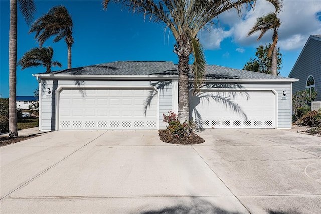 ranch-style home featuring a garage