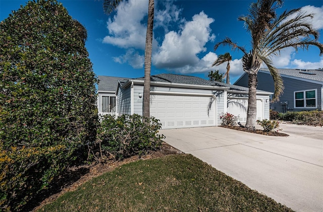 single story home featuring a garage