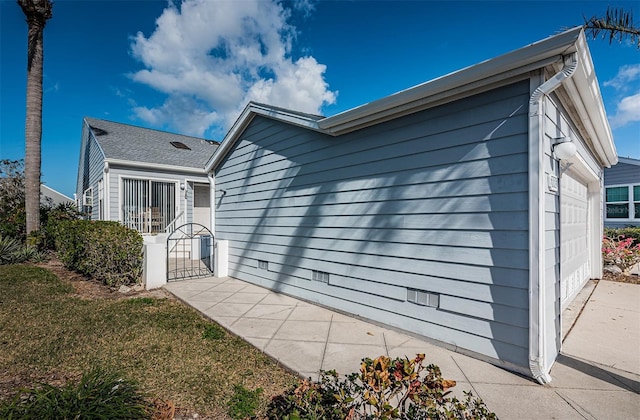 view of home's exterior featuring a garage