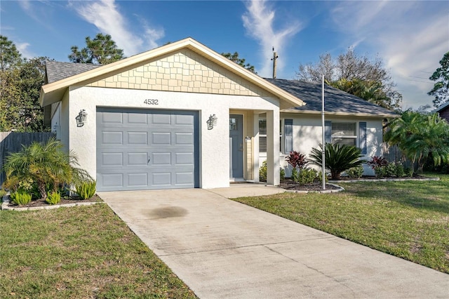 ranch-style home featuring a garage and a front yard