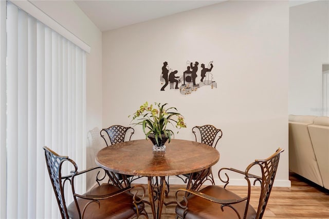 dining area featuring light hardwood / wood-style floors