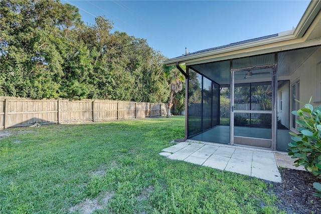 view of yard with a sunroom