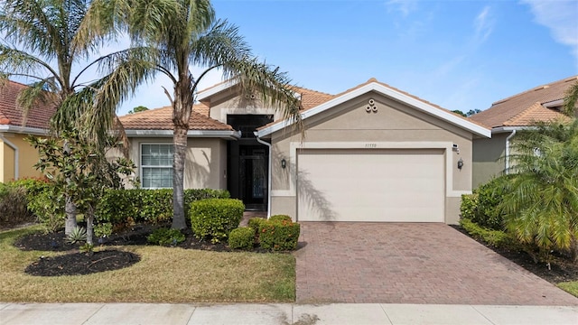 11550 Blackfin St, Venice, FL 34292 - view of front of house with a garage