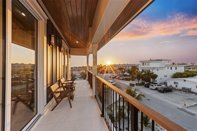 view of balcony at dusk