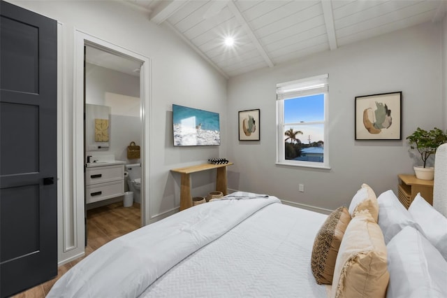 bedroom with lofted ceiling with beams, hardwood / wood-style flooring, and wood ceiling