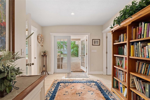 doorway featuring light tile patterned floors