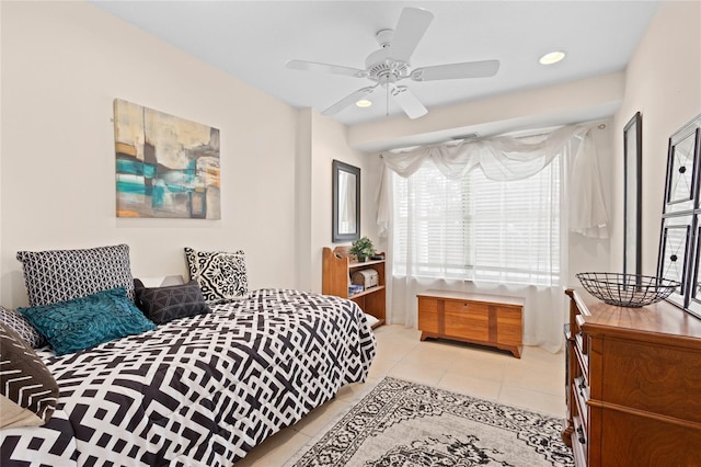 bedroom with light tile patterned floors and ceiling fan