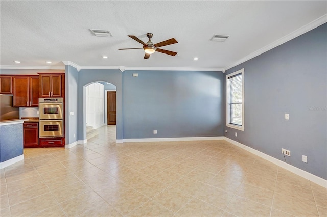 unfurnished living room featuring a textured ceiling, ceiling fan, ornamental molding, and light tile patterned flooring