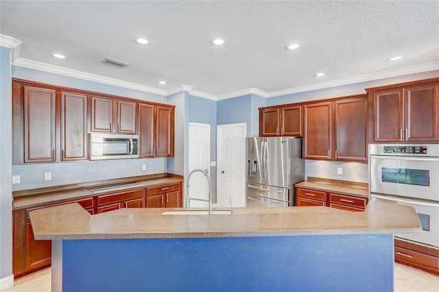 kitchen with a spacious island, crown molding, sink, light tile patterned floors, and stainless steel appliances