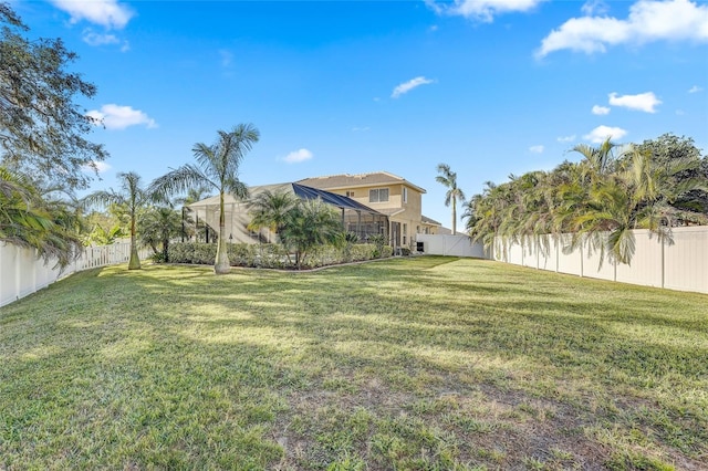 view of yard featuring a lanai