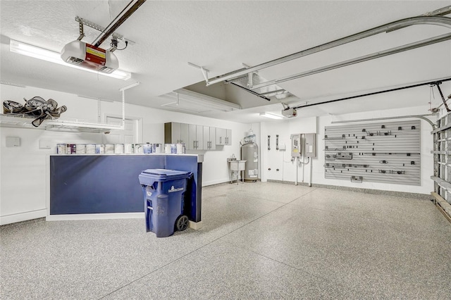 garage featuring electric water heater, electric panel, and a garage door opener