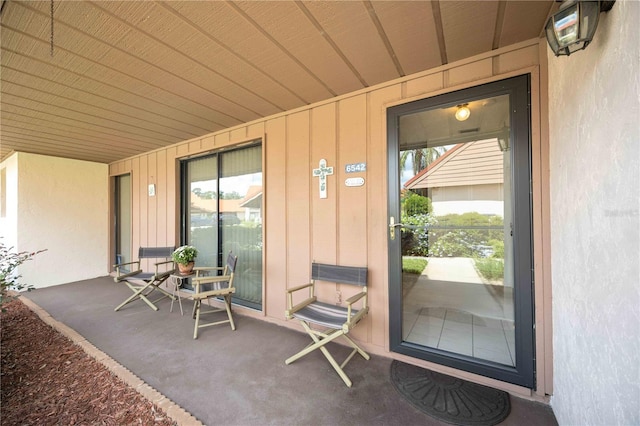 property entrance featuring covered porch