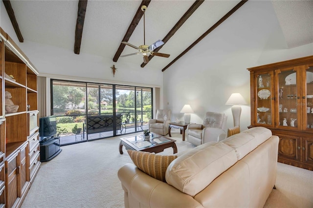 carpeted living room with ceiling fan, a textured ceiling, high vaulted ceiling, and beamed ceiling