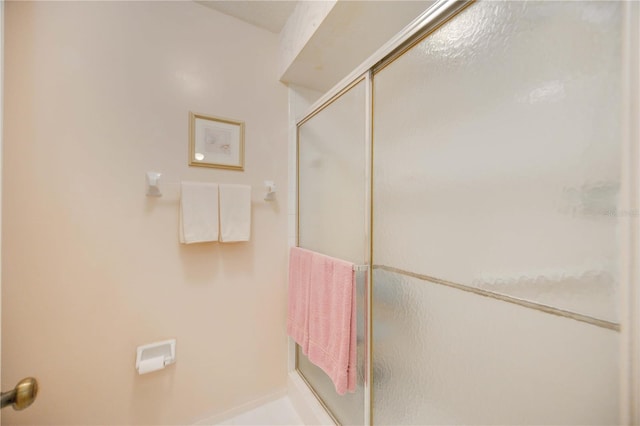 bathroom featuring walk in shower