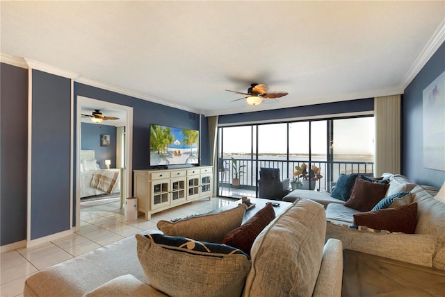 tiled living room featuring ceiling fan and ornamental molding