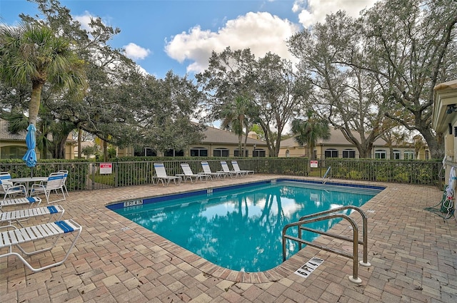 view of pool featuring a patio area