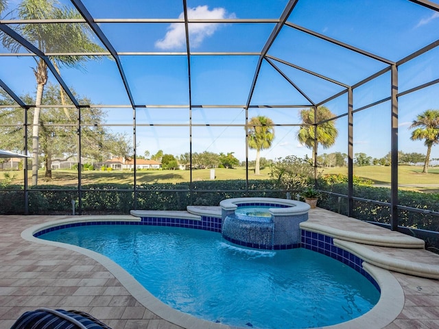 view of swimming pool with a lanai and an in ground hot tub