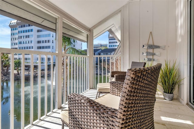 balcony featuring a water view