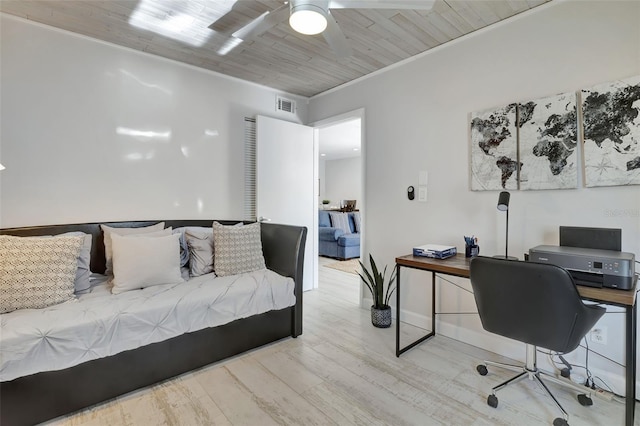 office area with ceiling fan, light hardwood / wood-style floors, ornamental molding, and wood ceiling