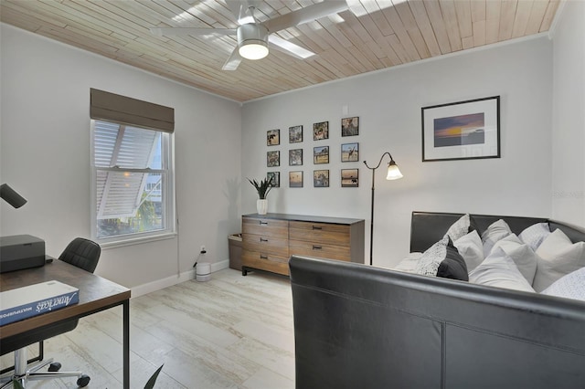 office with ceiling fan, light wood-type flooring, and wooden ceiling