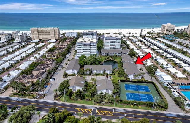 aerial view with a beach view and a water view