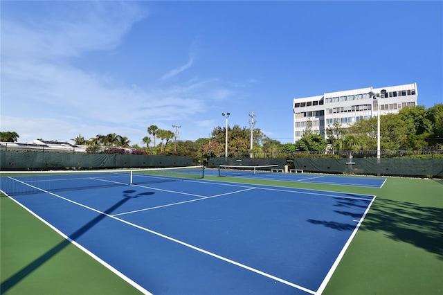 view of tennis court with basketball court