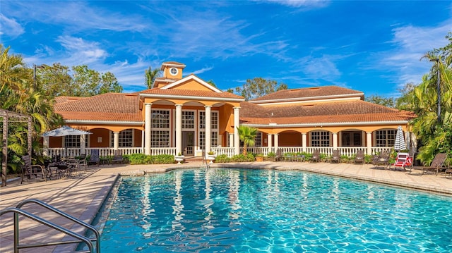 view of pool featuring a patio area