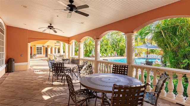 view of patio featuring ceiling fan