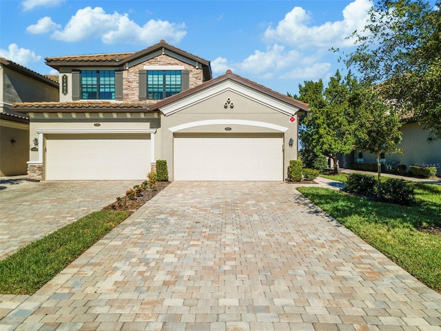 view of front of property with a garage