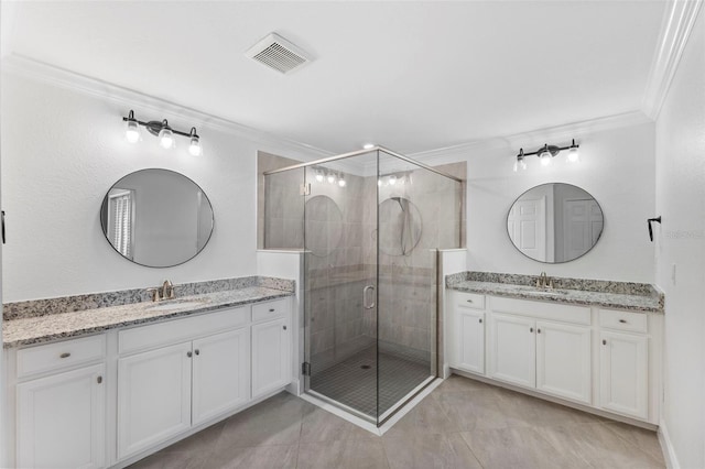 bathroom with tile patterned flooring, vanity, an enclosed shower, and crown molding