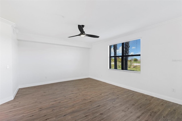 unfurnished room with dark hardwood / wood-style floors, ceiling fan, and crown molding