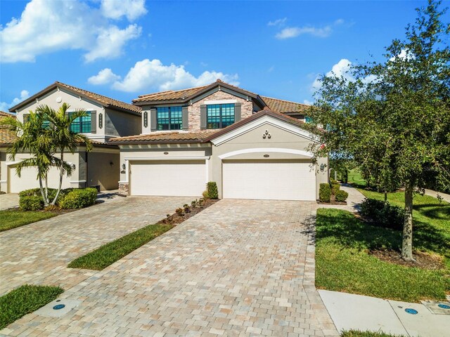 view of front of home with a garage