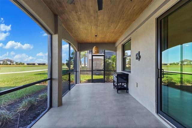 sunroom with wood ceiling