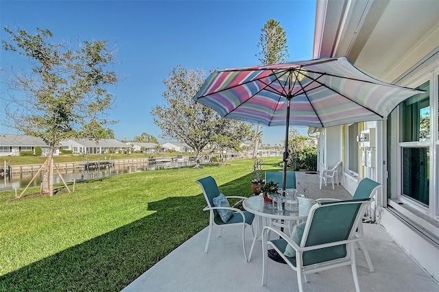 view of patio / terrace featuring a water view