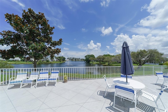 view of patio / terrace with a water view