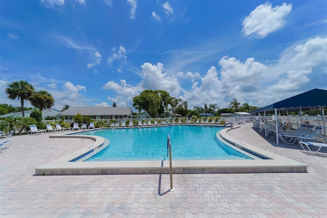 view of pool featuring a patio