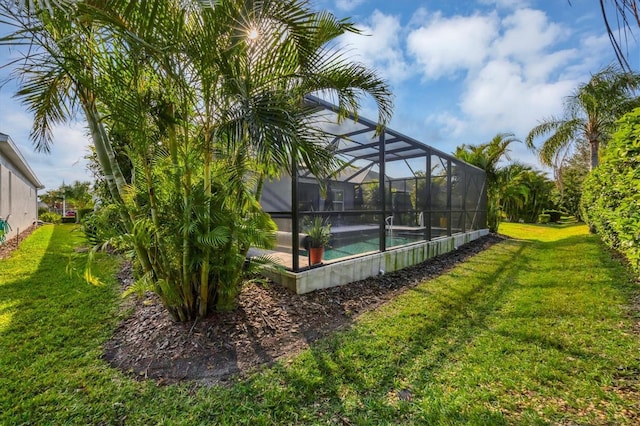 view of yard with a lanai