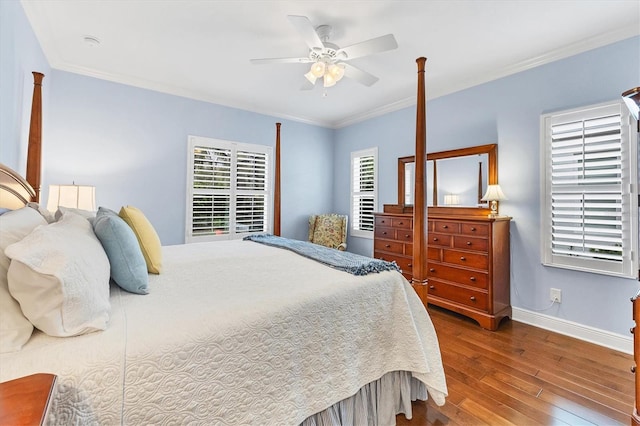 bedroom featuring ceiling fan, crown molding, and hardwood / wood-style flooring