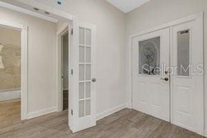 entryway with dark hardwood / wood-style floors