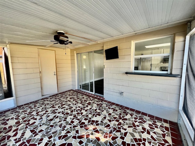 view of patio featuring ceiling fan