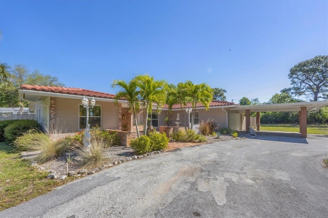 view of front of house with a carport